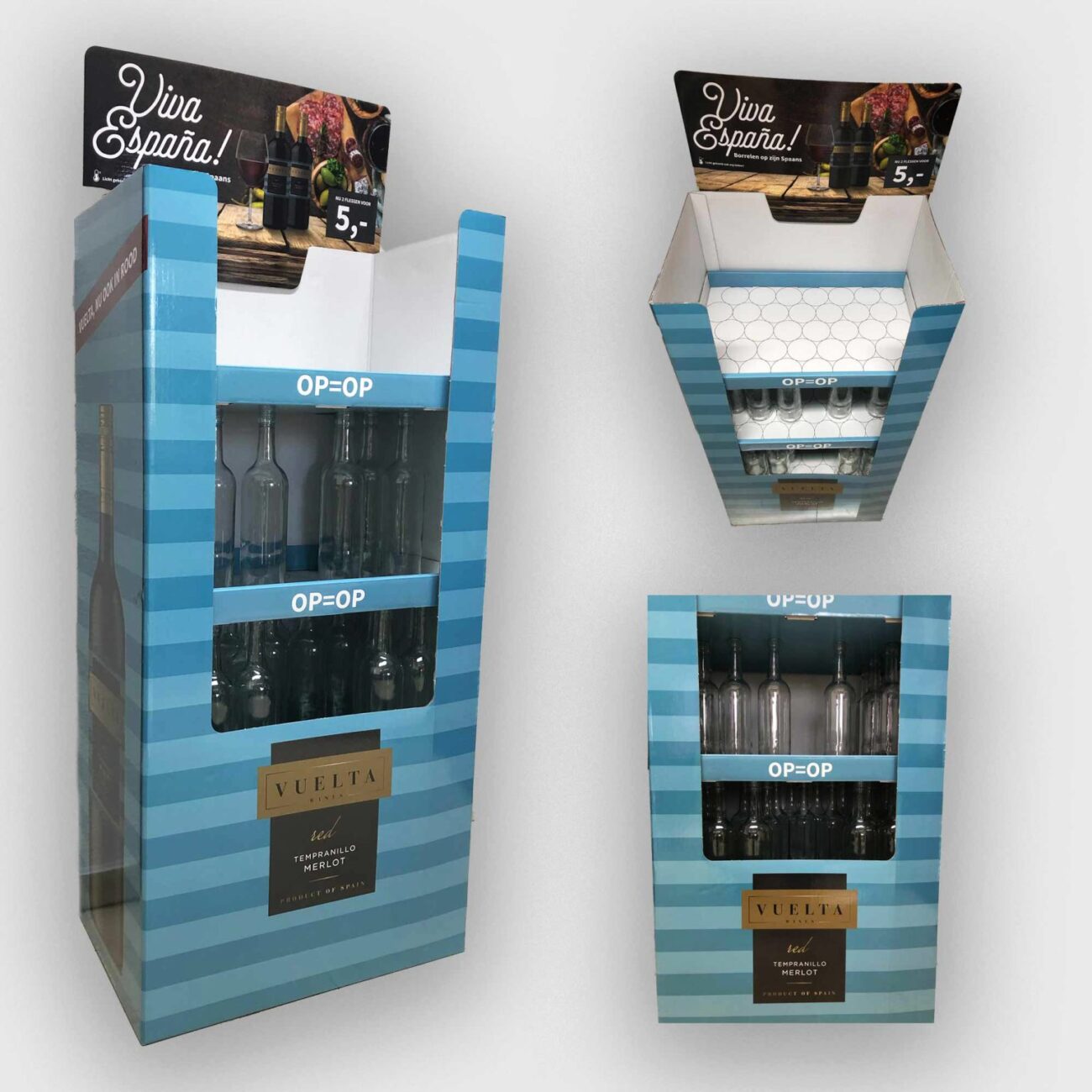 Blue striped wine display units with bottles visible on the shelves, featuring 'OP=OP' signs and a VUELTA Tempranillo Merlot label; promotional top card reads 'Viva España!'
